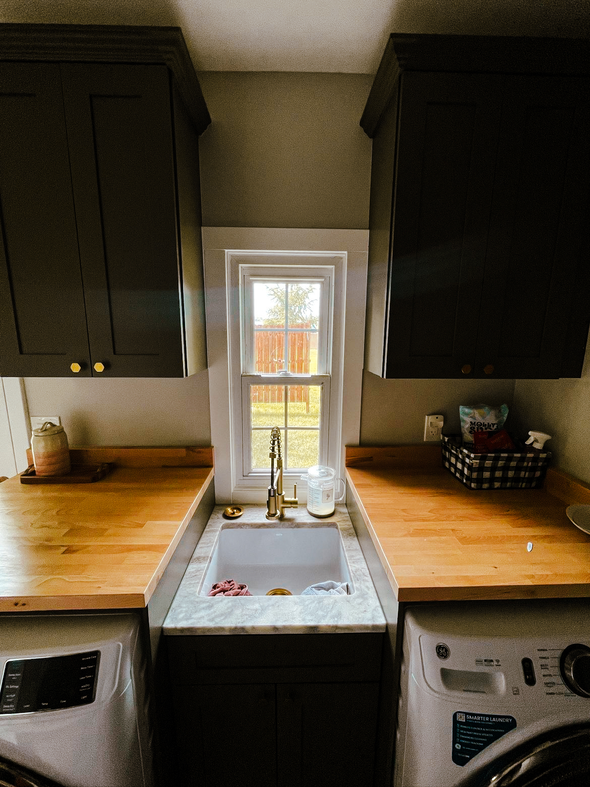 Custom butcher block countertop around a sink
